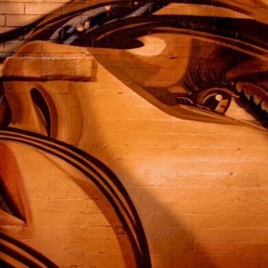 human face painting on wall